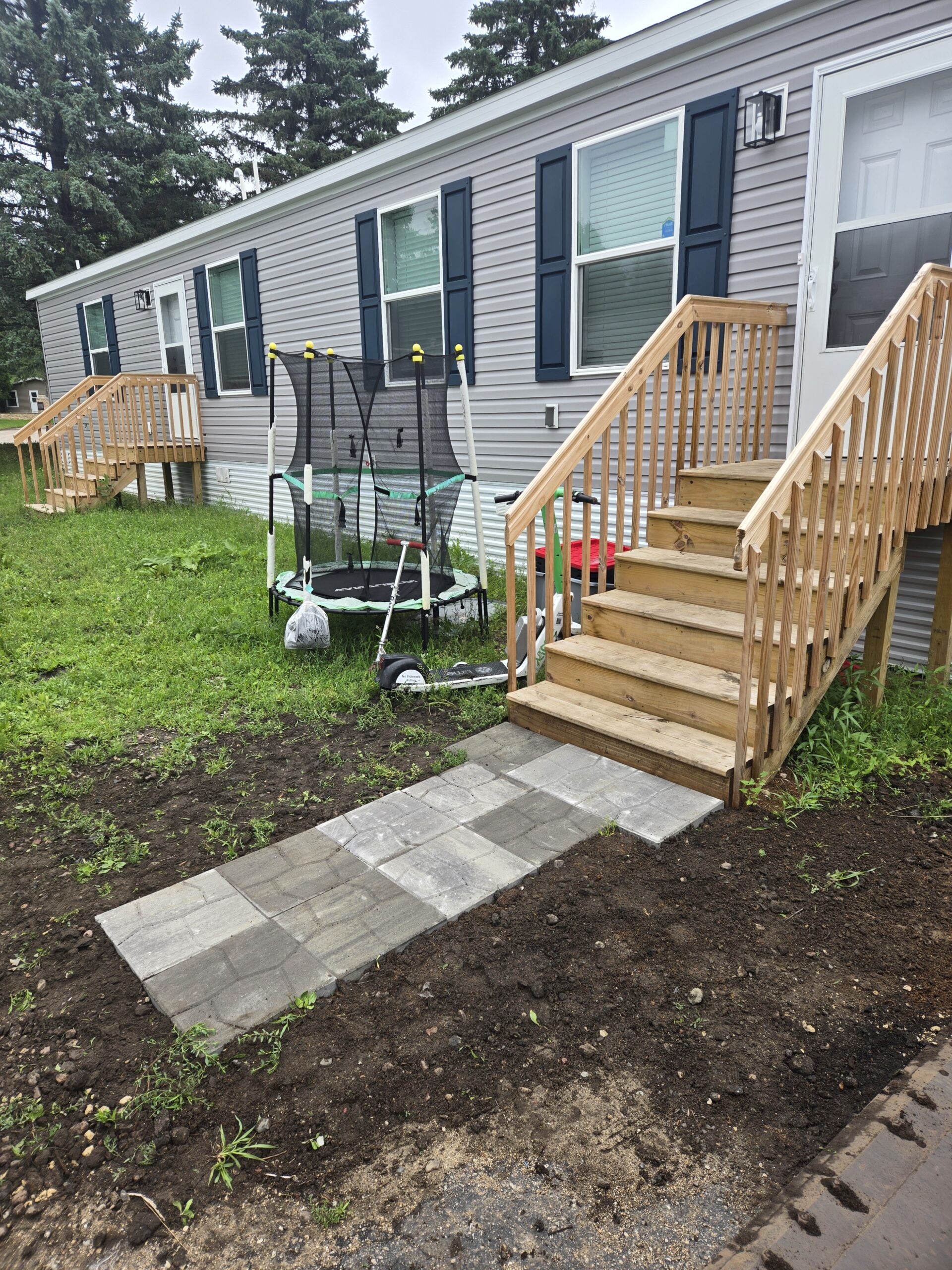 Young man smelling the potted plant<br />